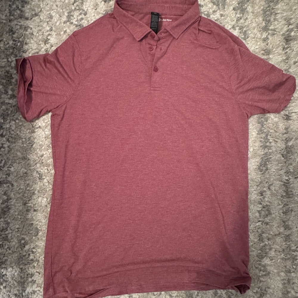 Men’s Lululemon “like new” red polo size larger. Never worn